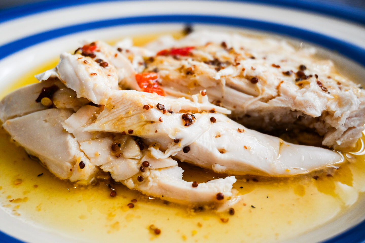 Serving of roast chicken (white meat only) drizzled with pan juices 