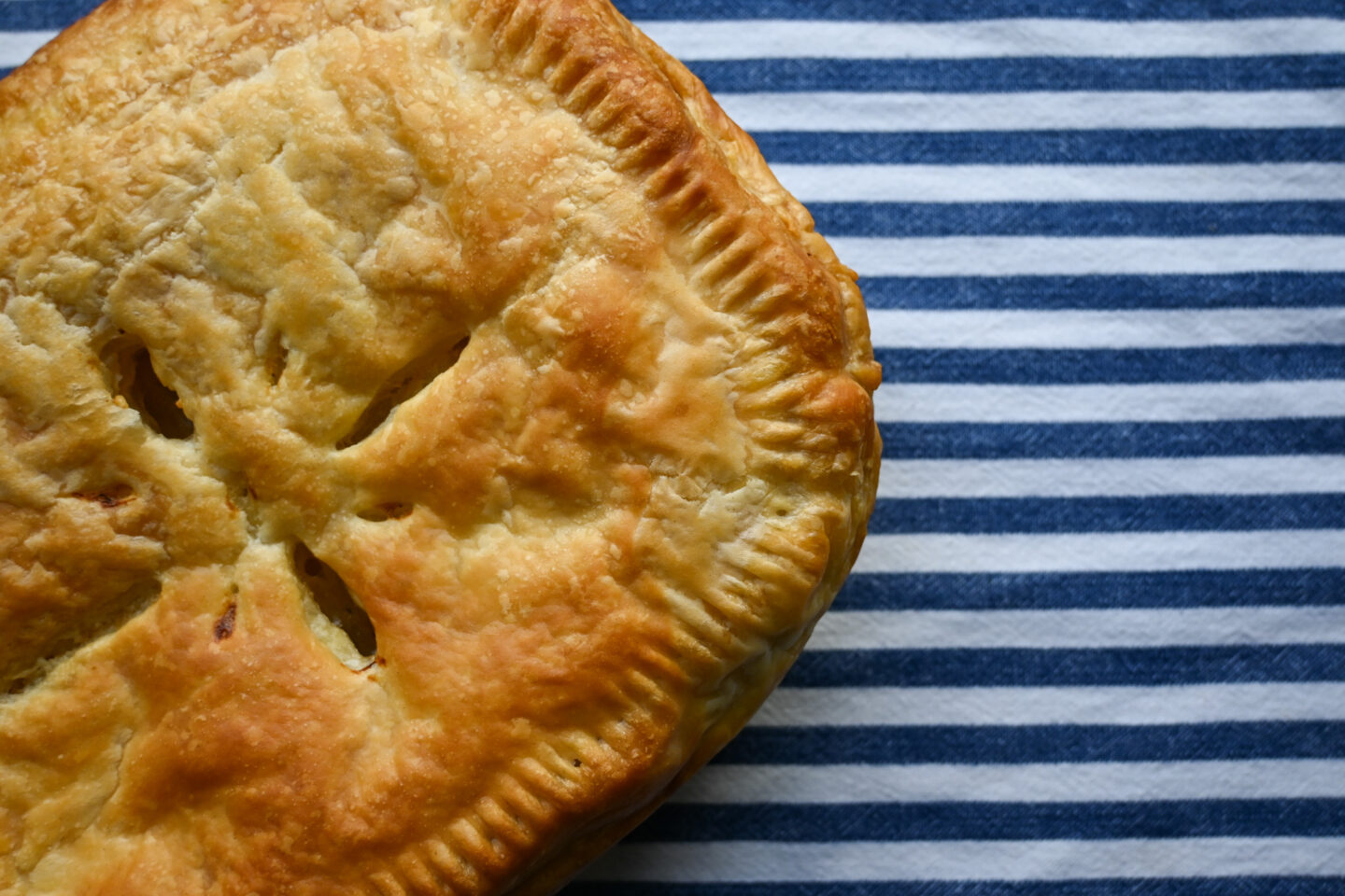 Close-up of pastry on Chicken & Pancetta Pie