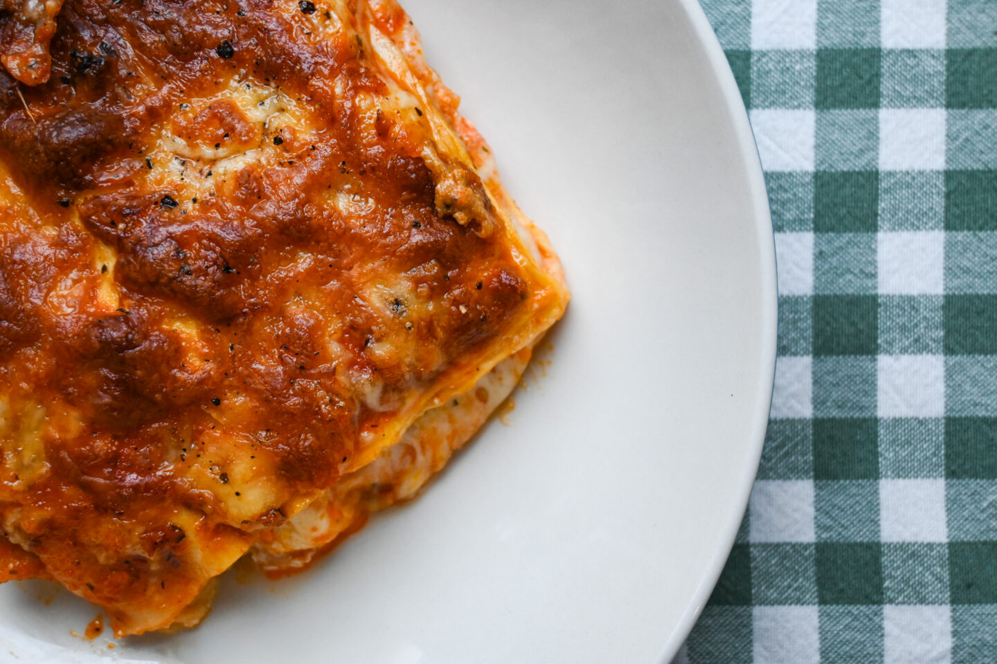 Slice of Sausage Mint Lasagna on a white plate